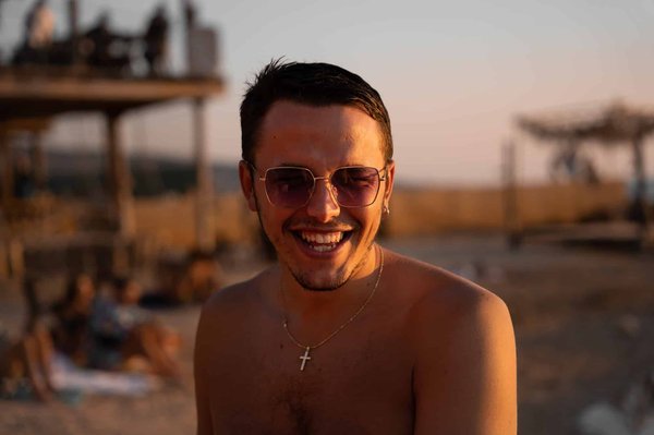 Why is it necessary to wear a cross pendant ?